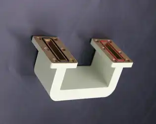 What are the key design features of double-bend waveguides？